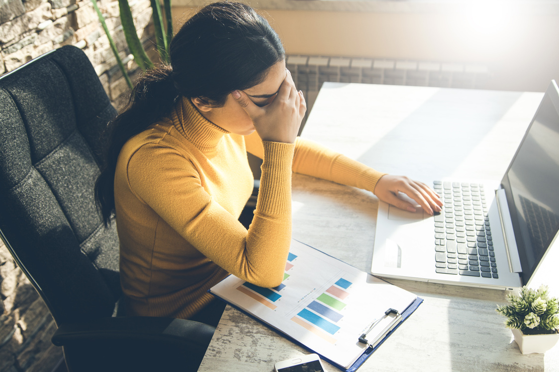 sad woman  in office